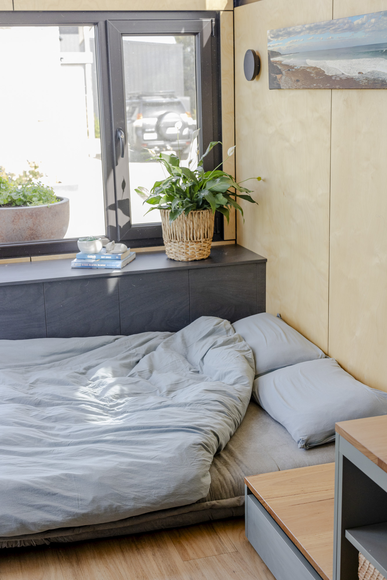 Ground Floor Living Space with Double Sofa Bed | Luxe Loft Tiny Home Spacious ground-floor living area in Luxe Loft Tiny Home with enough room for a double sofa bed