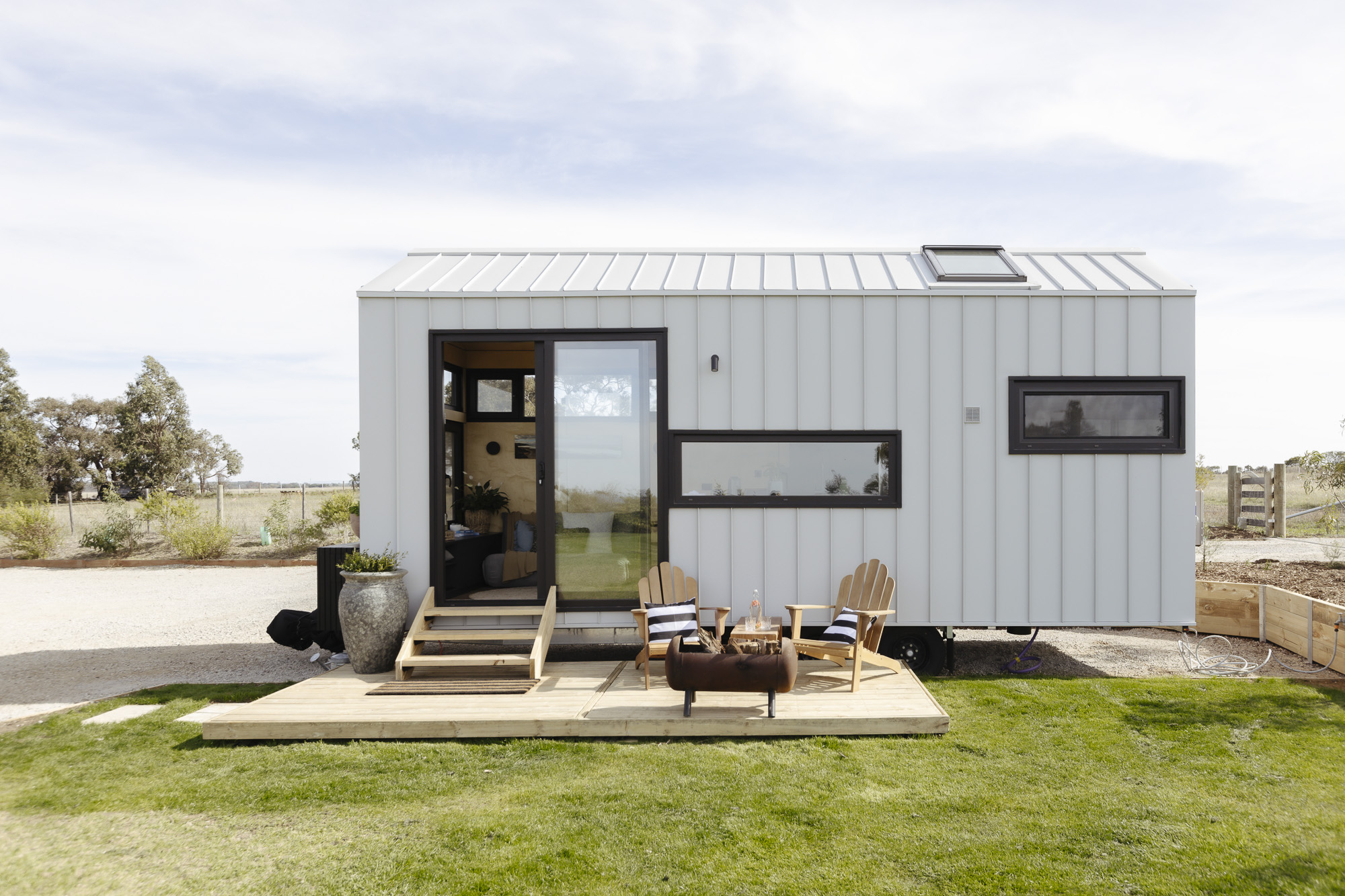 7.2m Luxe Tiny Home on Wheels with deck and Colorbond cladding in grey