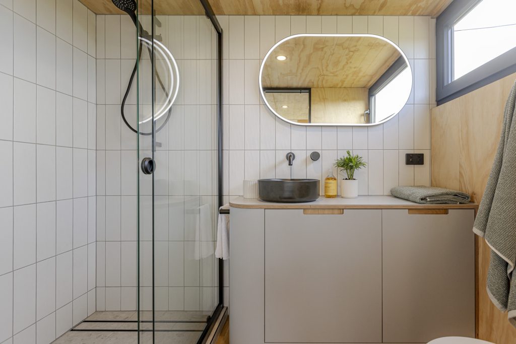 Guest-ready bathroom in a tiny home on wheels