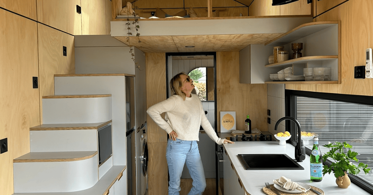Interior layout design of a tiny home on wheels showcasing a functional and modern living space with customizable features, including smart storage, natural light, and efficient use of space