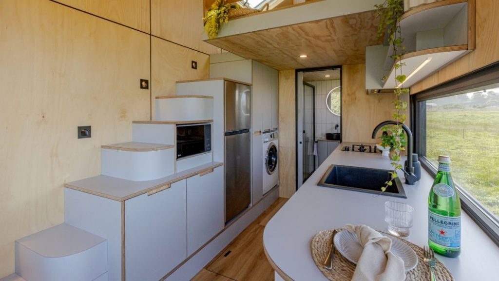 Tiny home on wheels kitchen and compact interior layout
