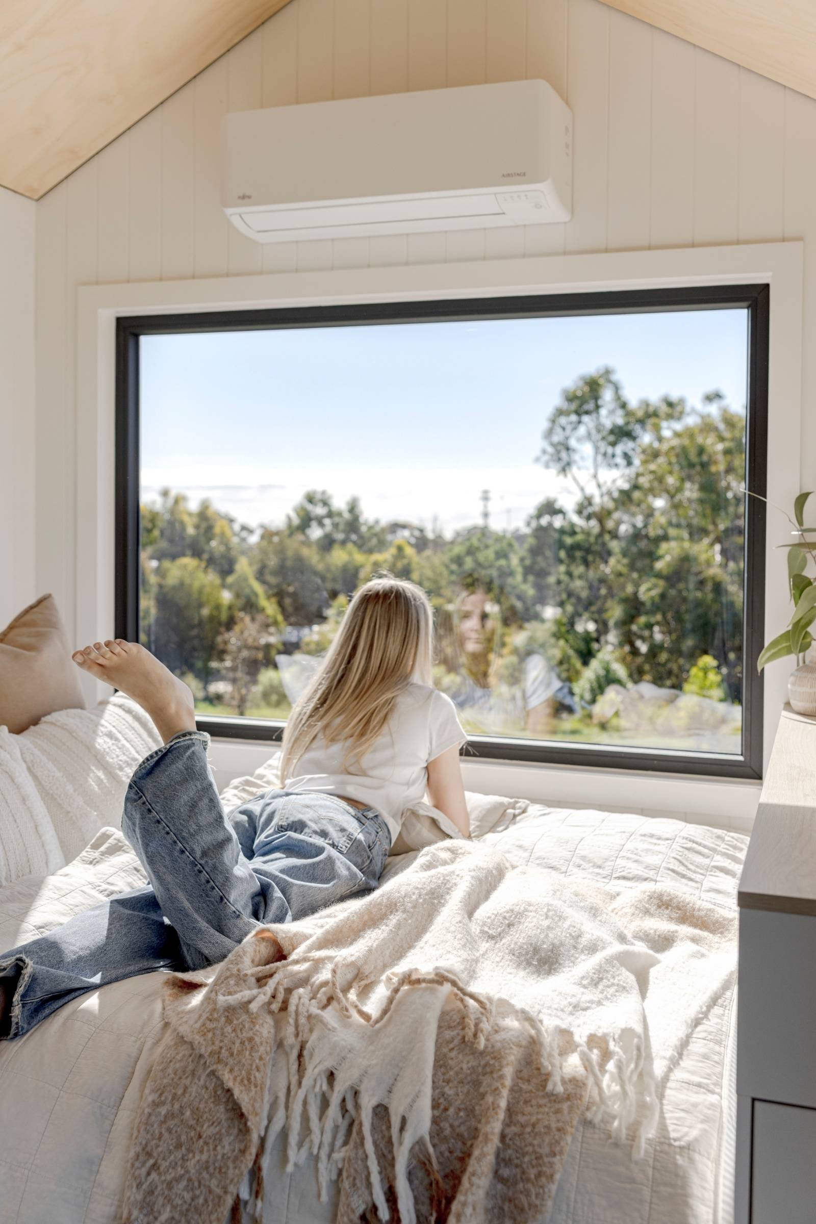 guest enjoying tiny home on wheels outlook